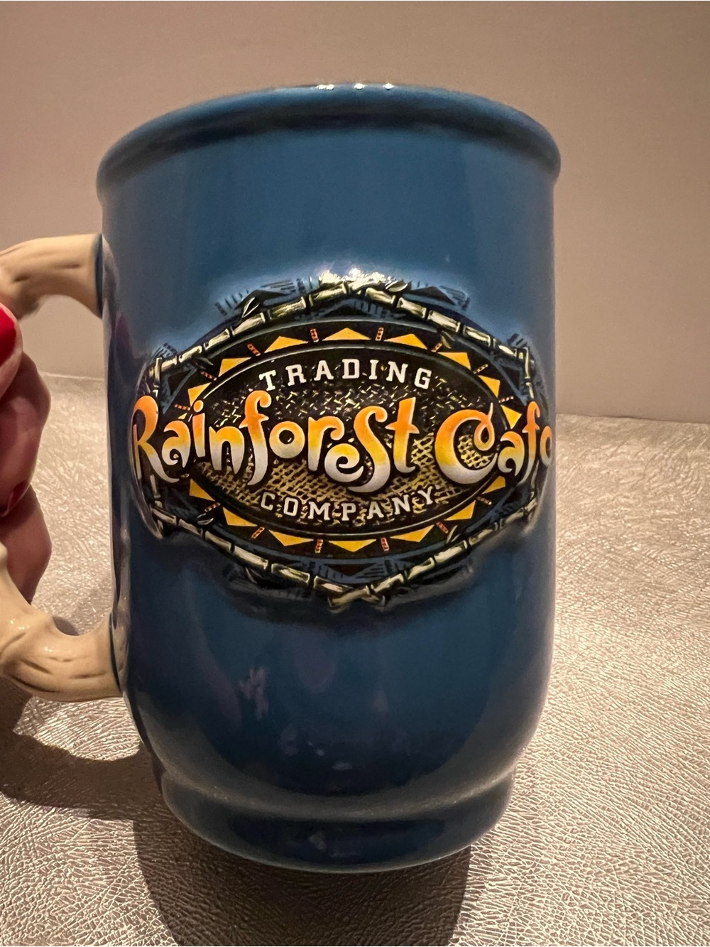 Rainforest Cafe 3D Logo Ceramic Coffee Mug Simulated Bamboo Handle 16 oz Blue.